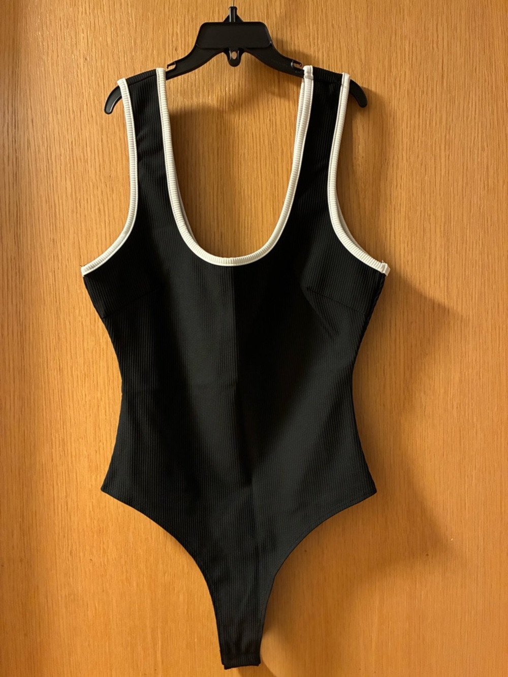Black One-Piece Ribbed Bodysuit with White Trim